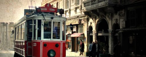 An image of the bustling Istiklal Street in Beyoglu, Istanbul, featuring the iconic vintage tram.